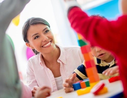 Therapist supporting a student
